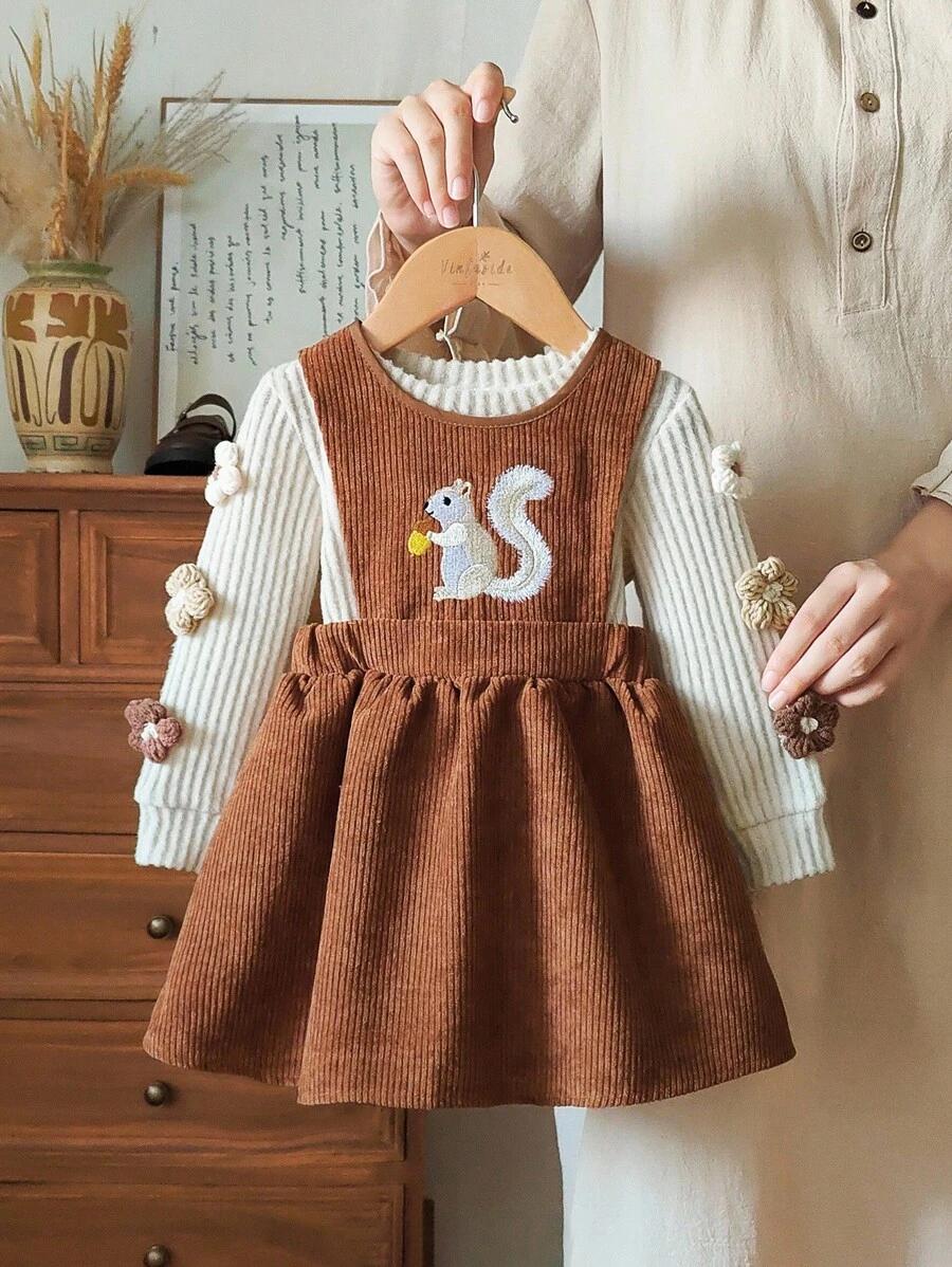 beżowy sweter kwiaty 