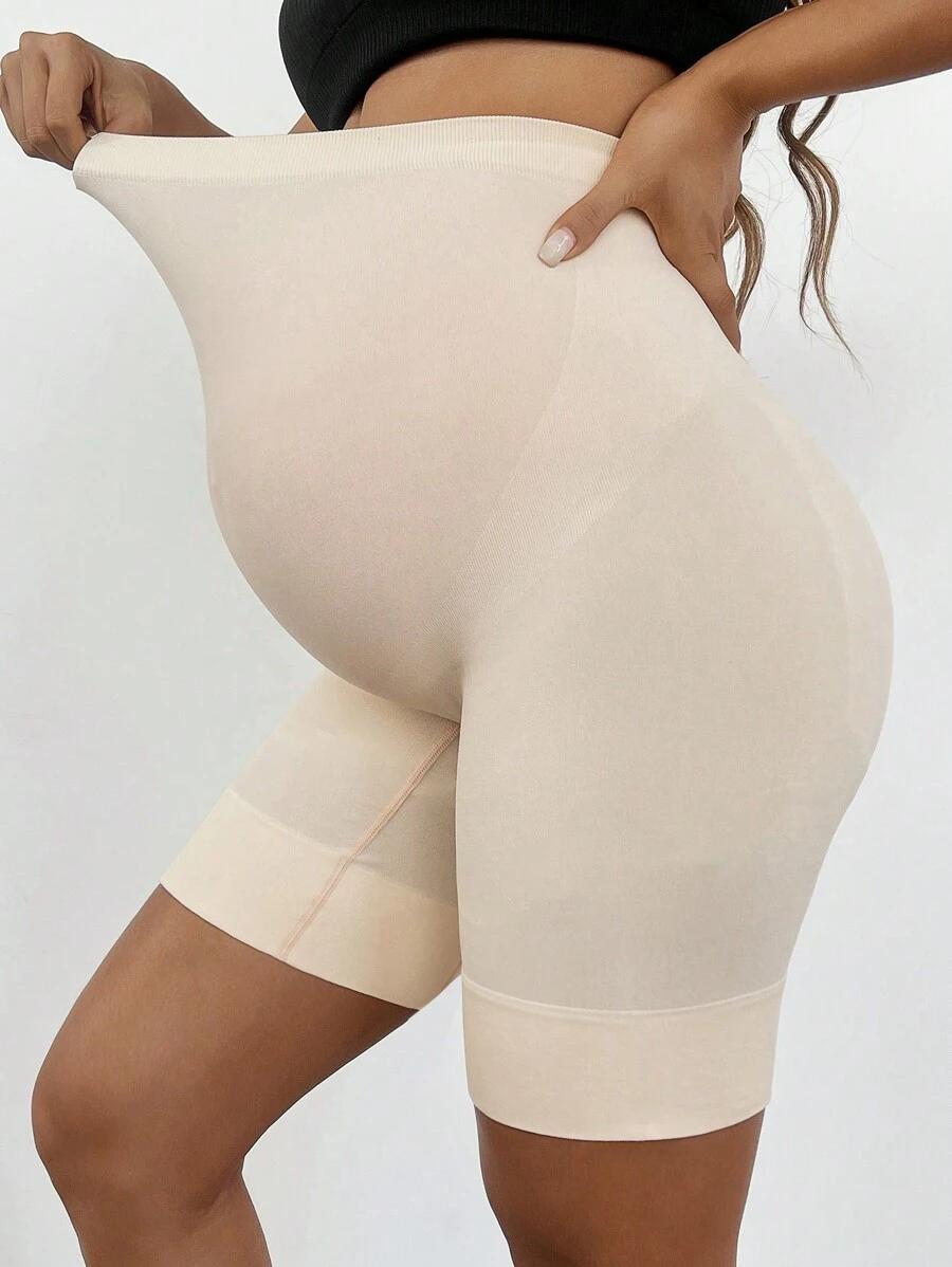 beżowe krótkie legginsy