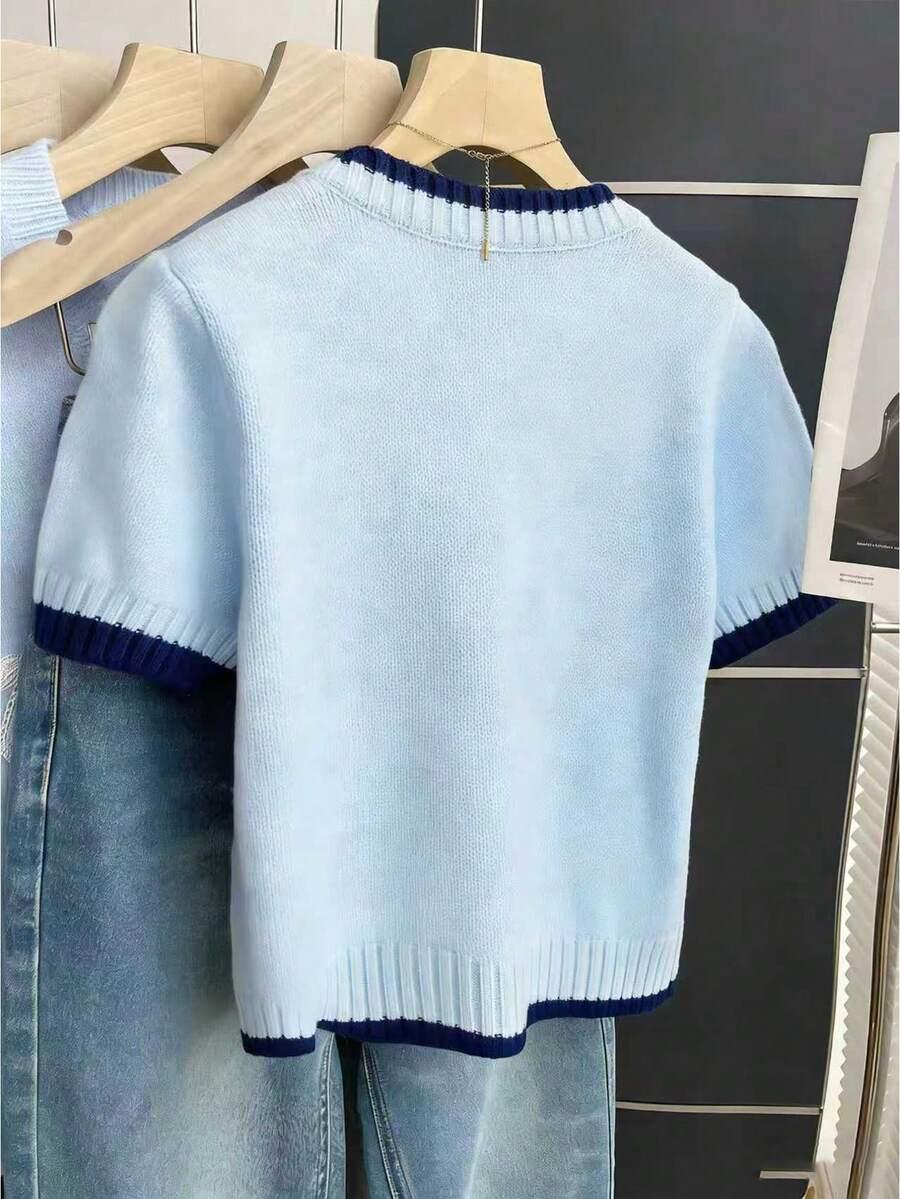 niebieski sweter krótki rękaw