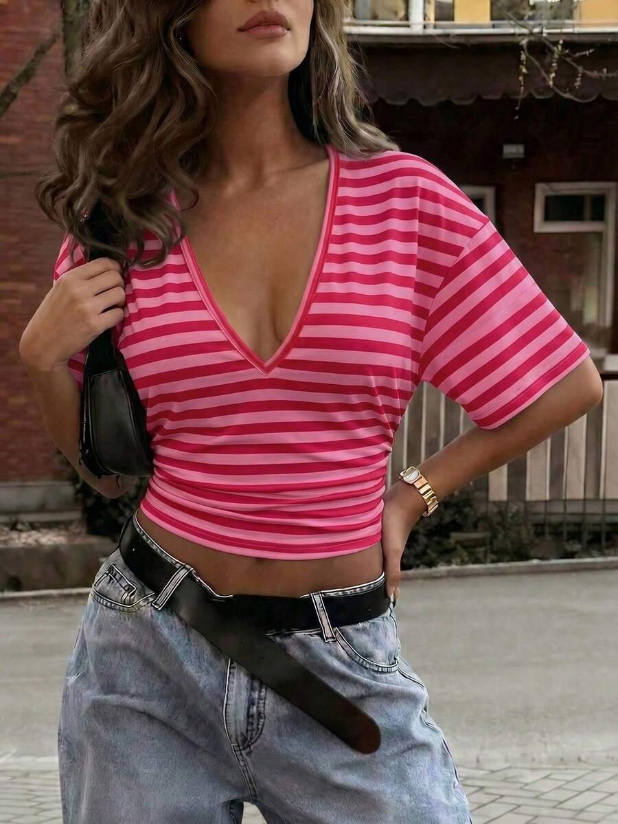 różowa bluzka v neck paski