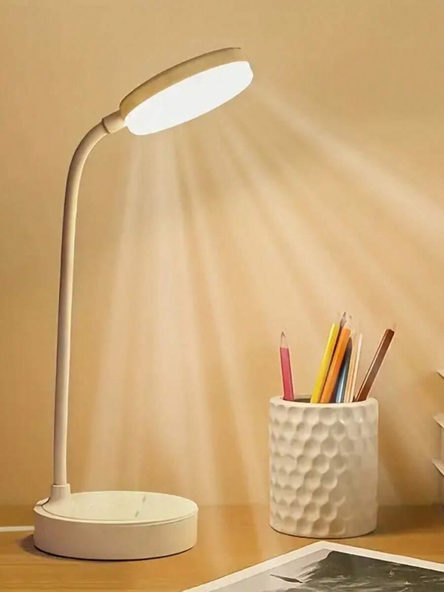 biała lampa na biurko
