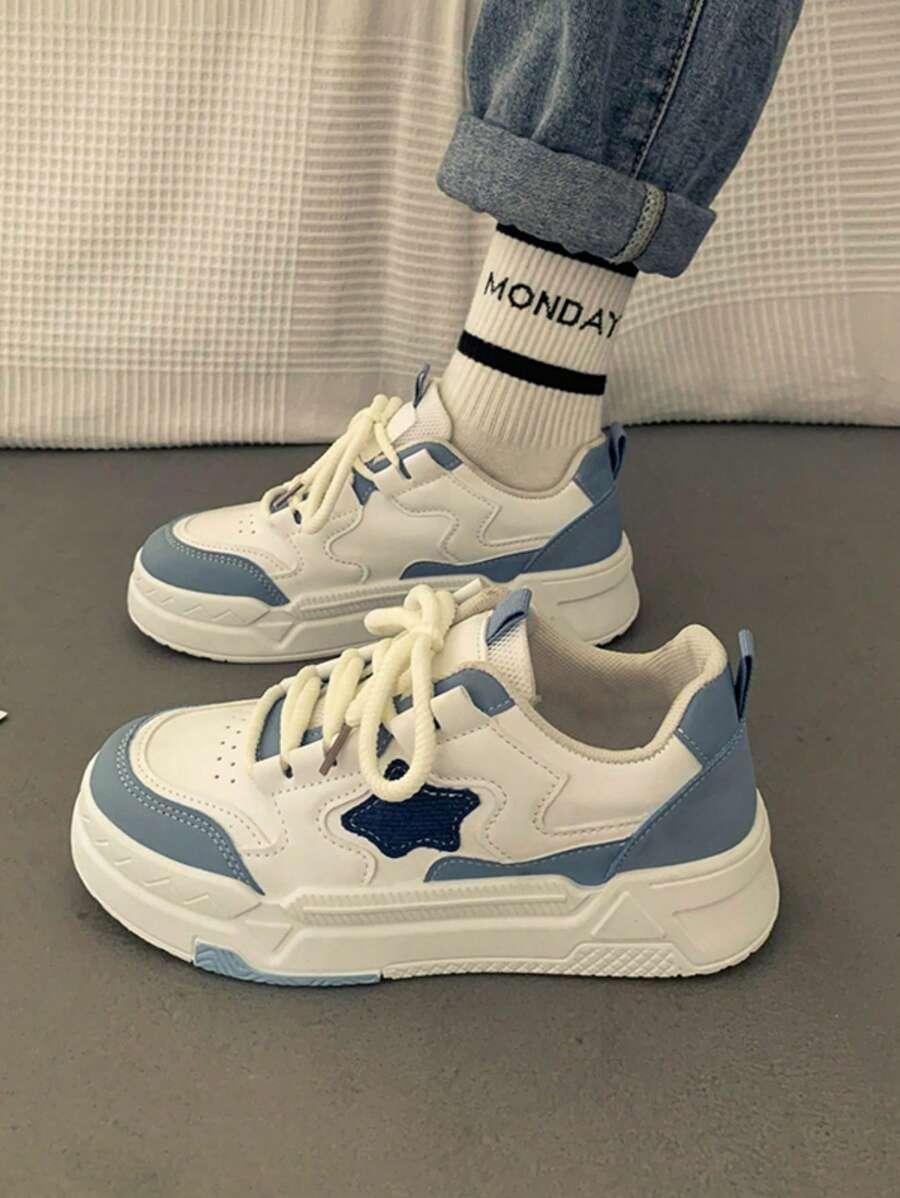 sznurowane buty sportowe