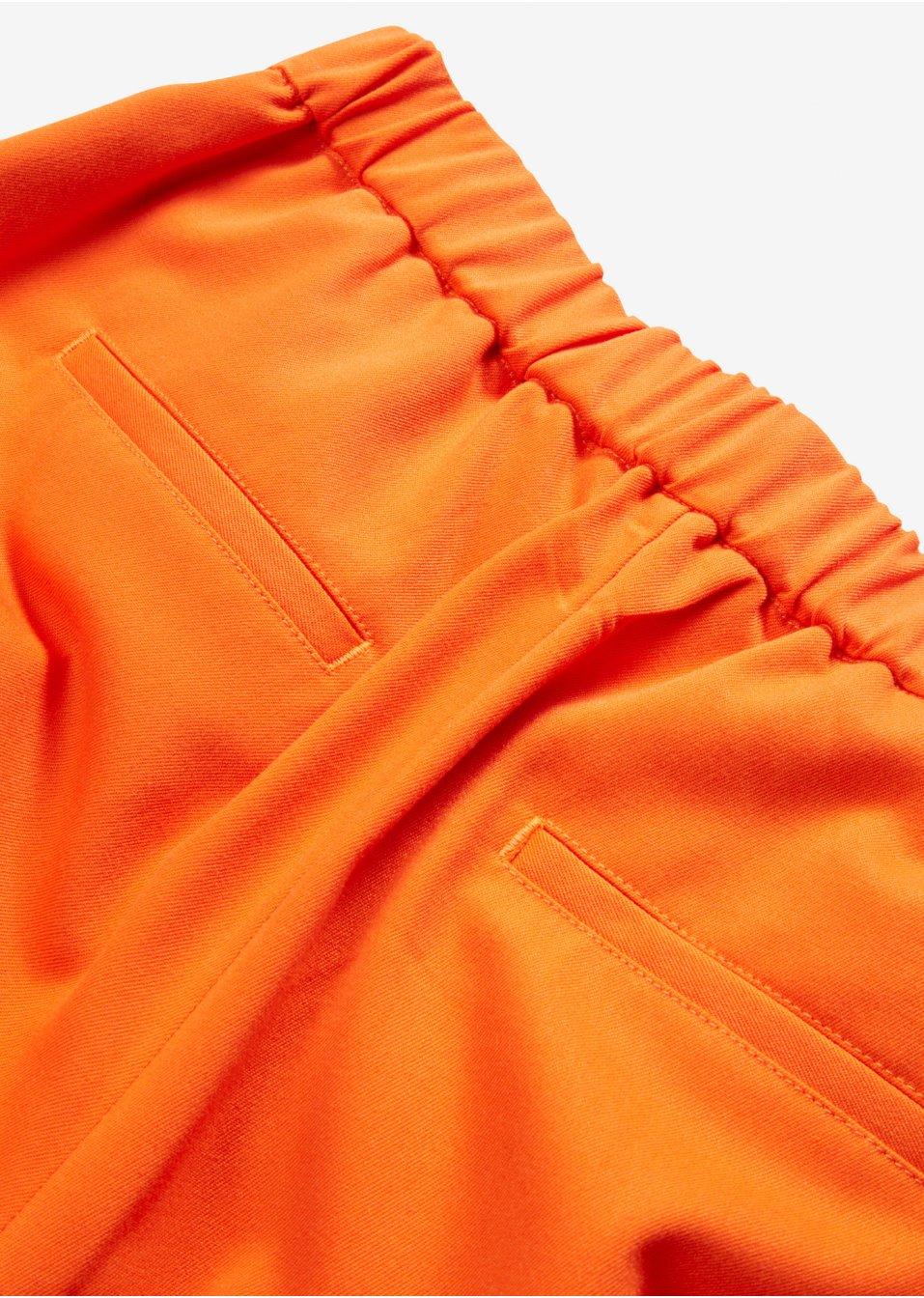 POMARAŃCZOWE SPODNIE ZIP