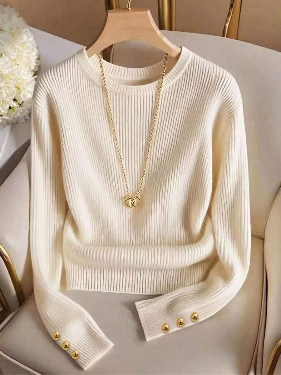 beżowy sweter prążki