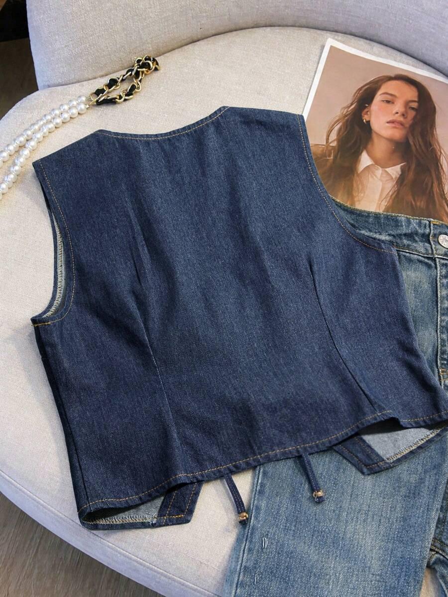 niebieska kamizelka jeans