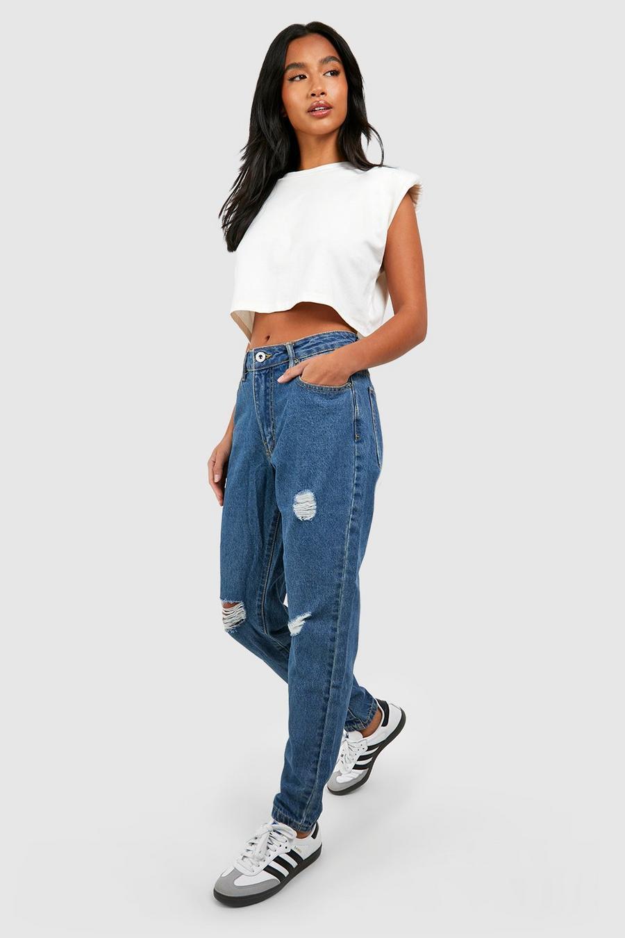 SPODNIE JEANS PRZETARCIA 