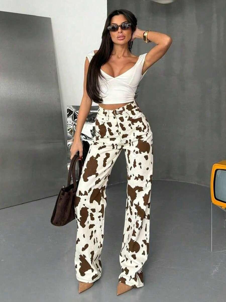 SPODNIE JEANS ANIMAL PRINT 