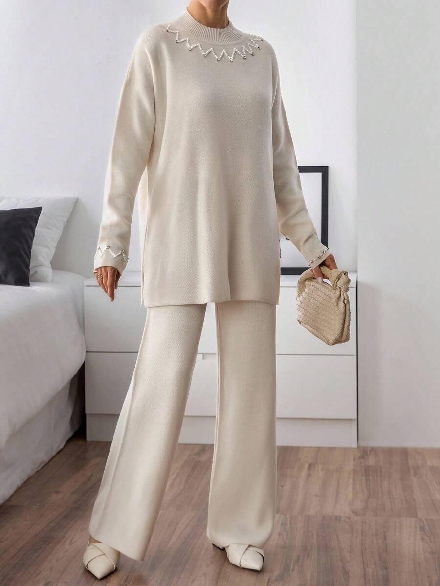kremowy dzianinowy sweter 