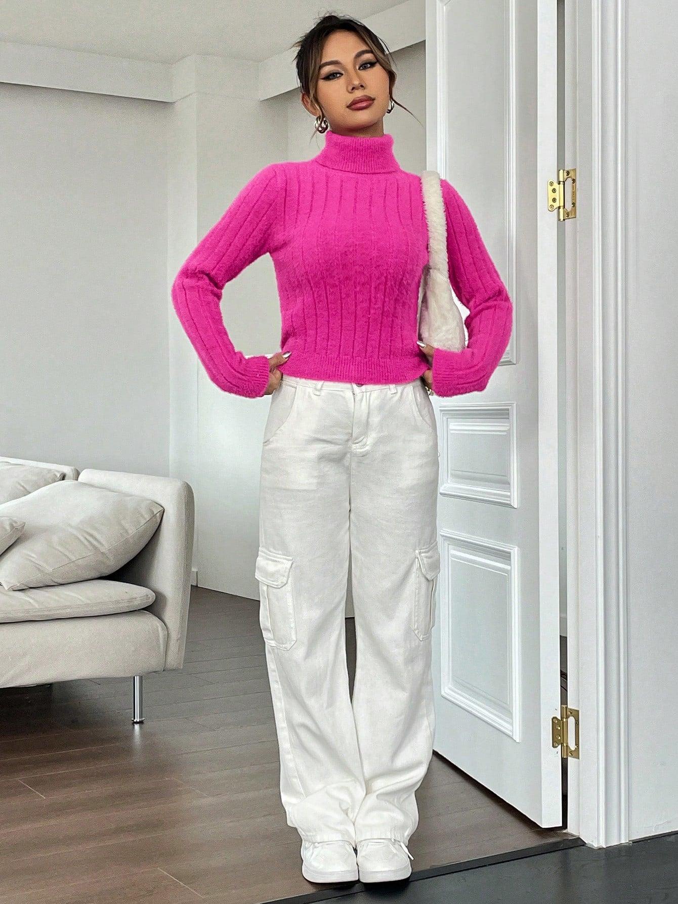 różowy prążkowany sweter golf