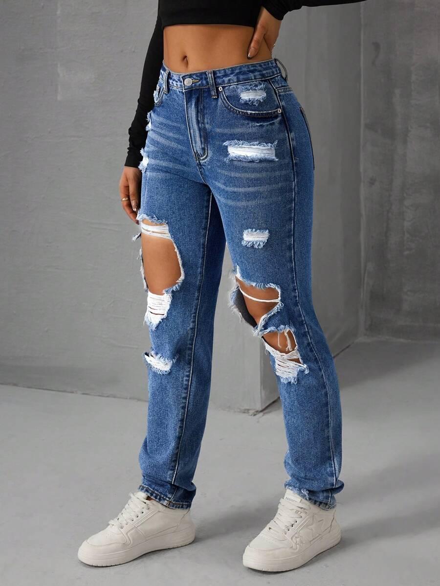 SPODNIE JEANS PRZETARCIA 