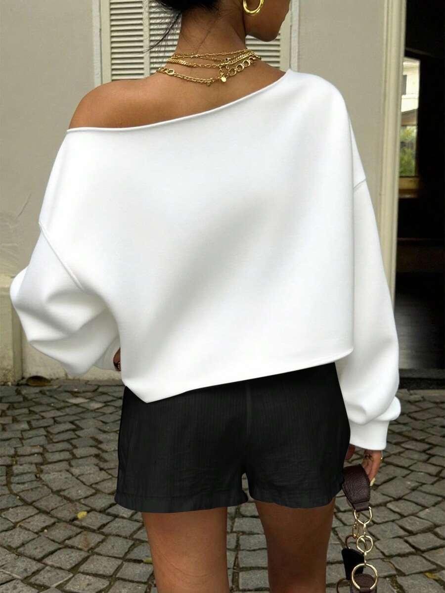 biała bluza oversize 