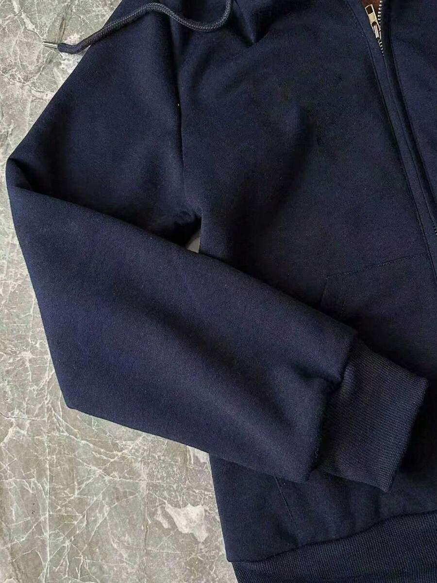 GRANATOWA ROZPINANA BLUZA Z KAPTUREM 