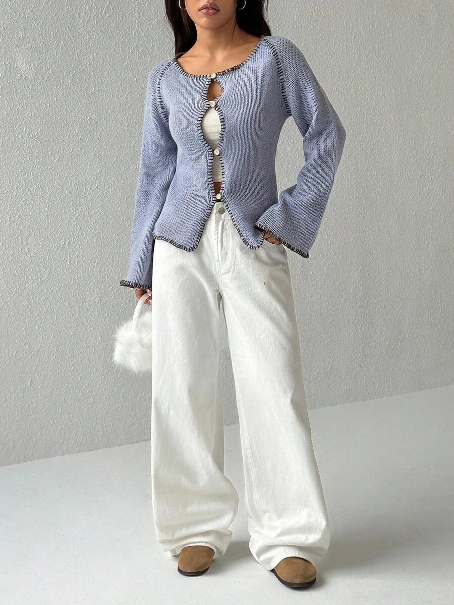 sweter guziki dzianina
