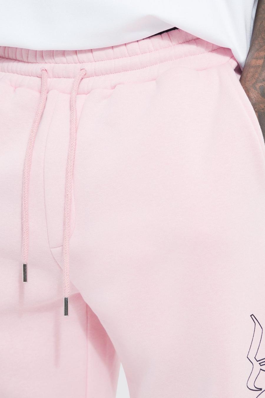 różowe spodnie dresowe na gumce print