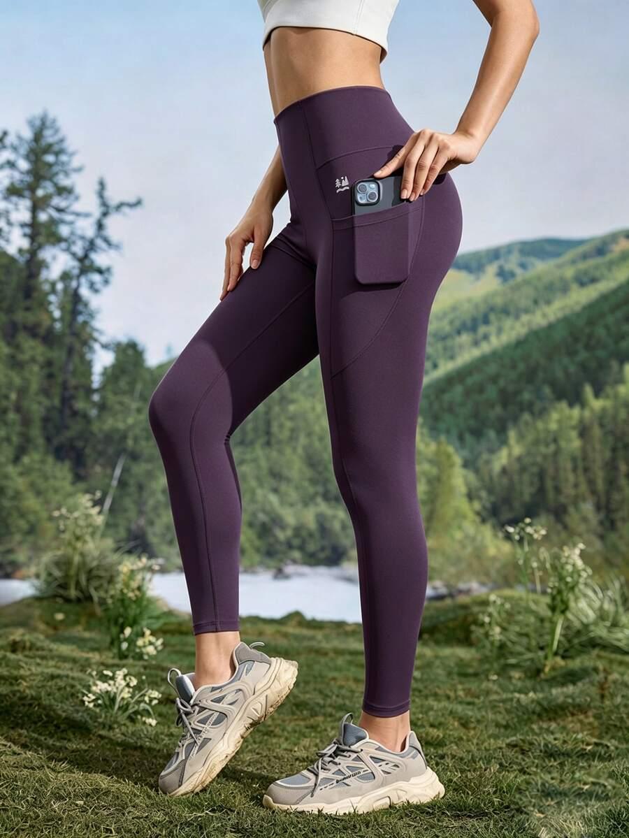 fioletowe legginsy kieszenie