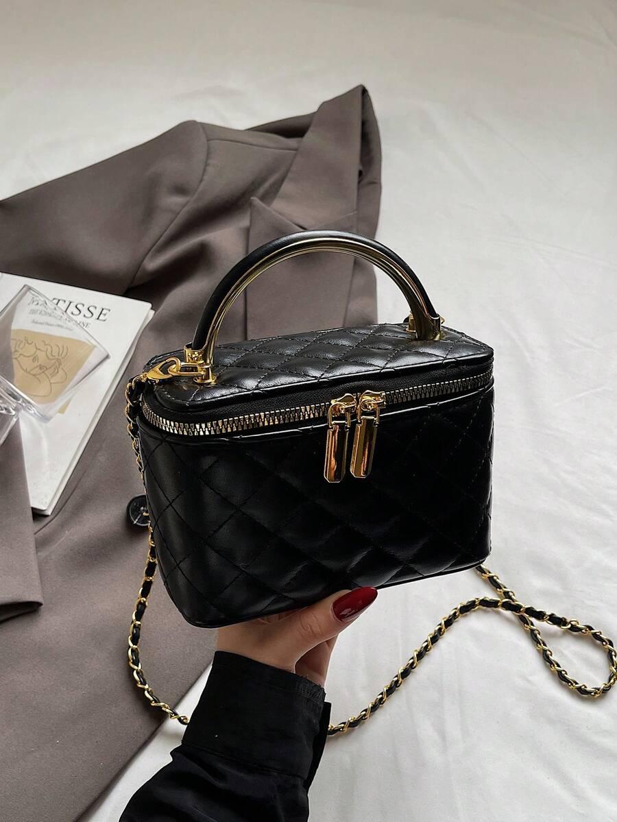 czarna torebka zip zdobinie