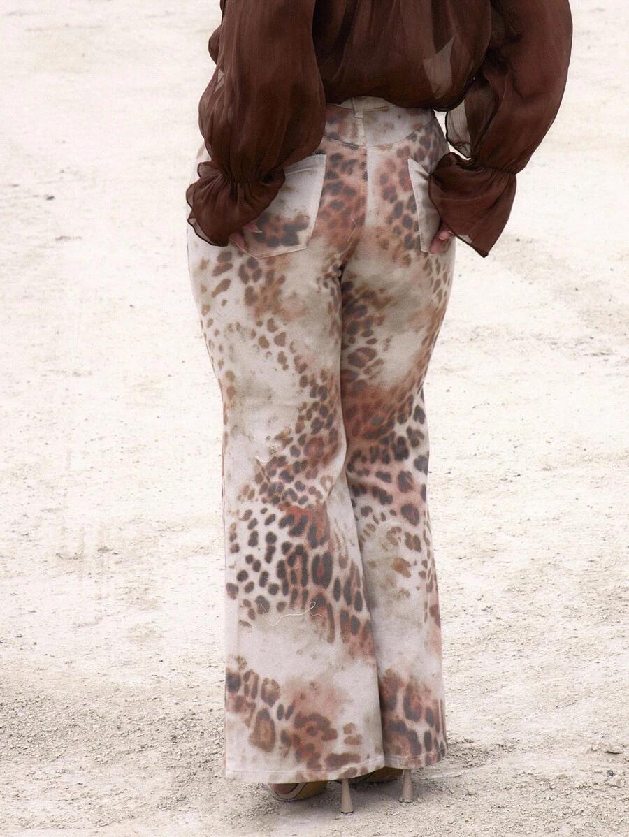 SPODNIE JEANS ANIMAL PRINT 