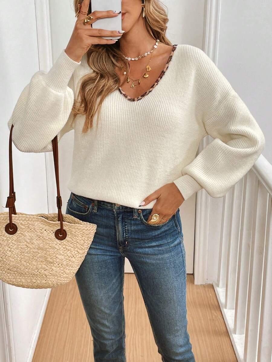 kremowy sweter v-neck