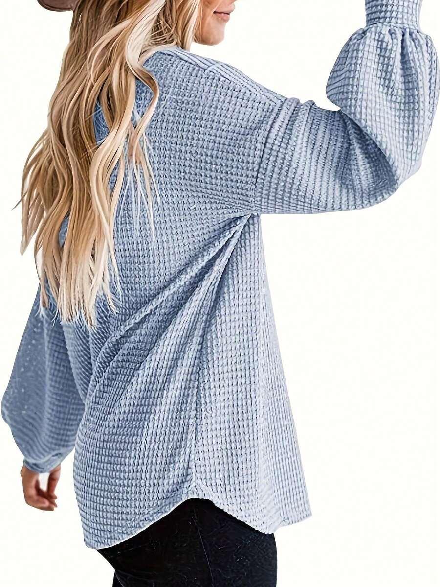 niebieski dzianinowy sweter 