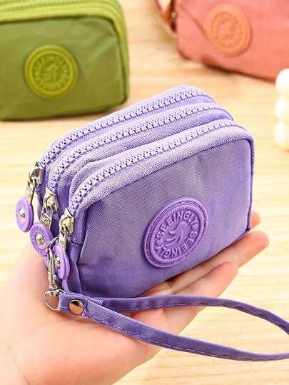 fioletowa portmonetka zip 