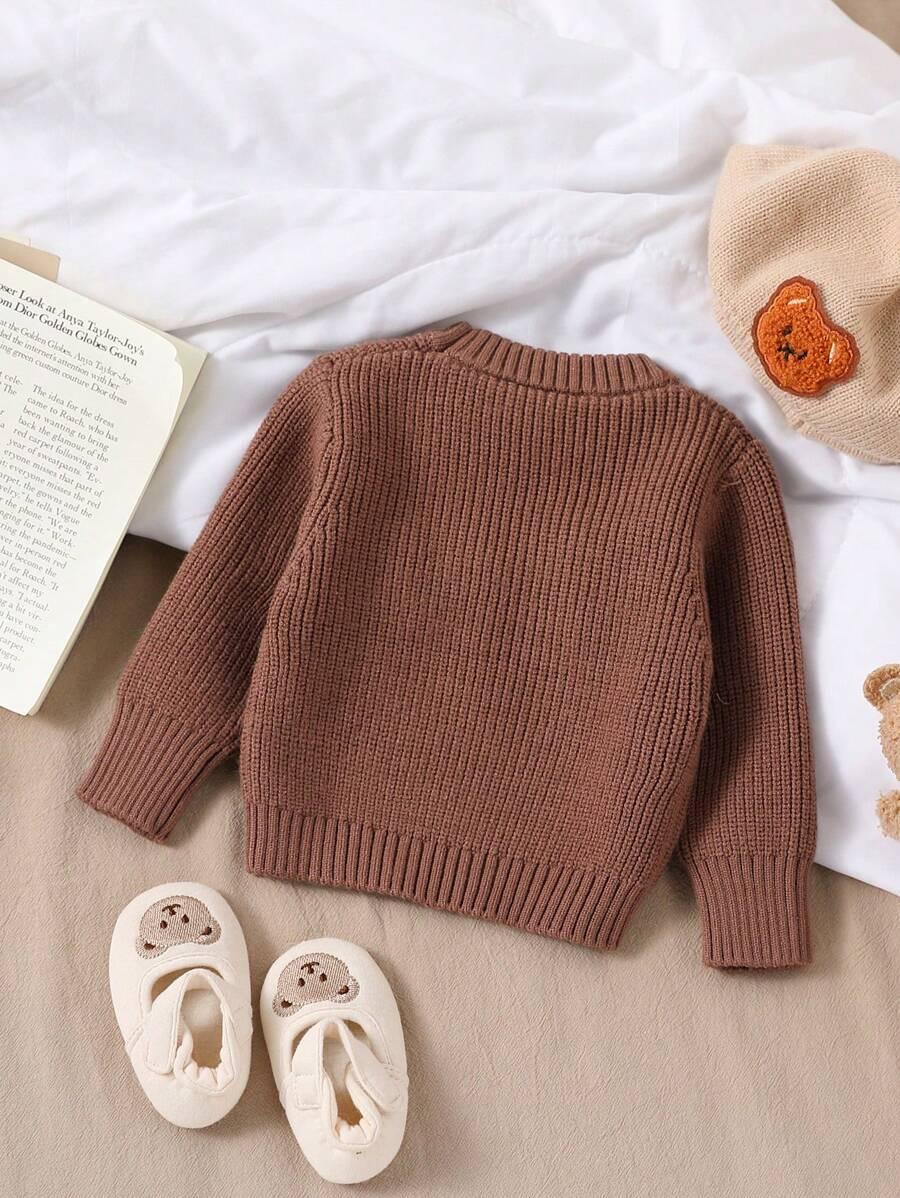 brązowy sweter okrągły dekolt