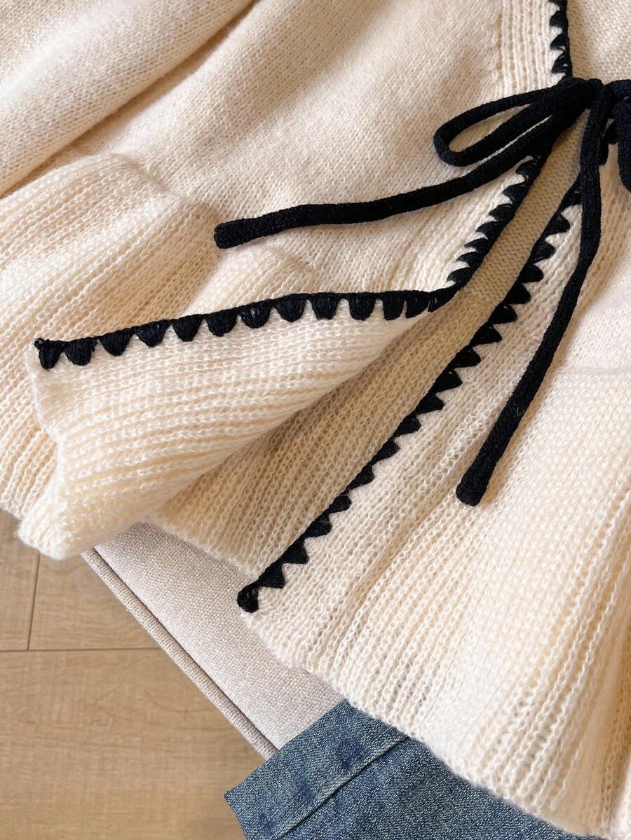 BEŻOWY SWETER WIĄZANIE