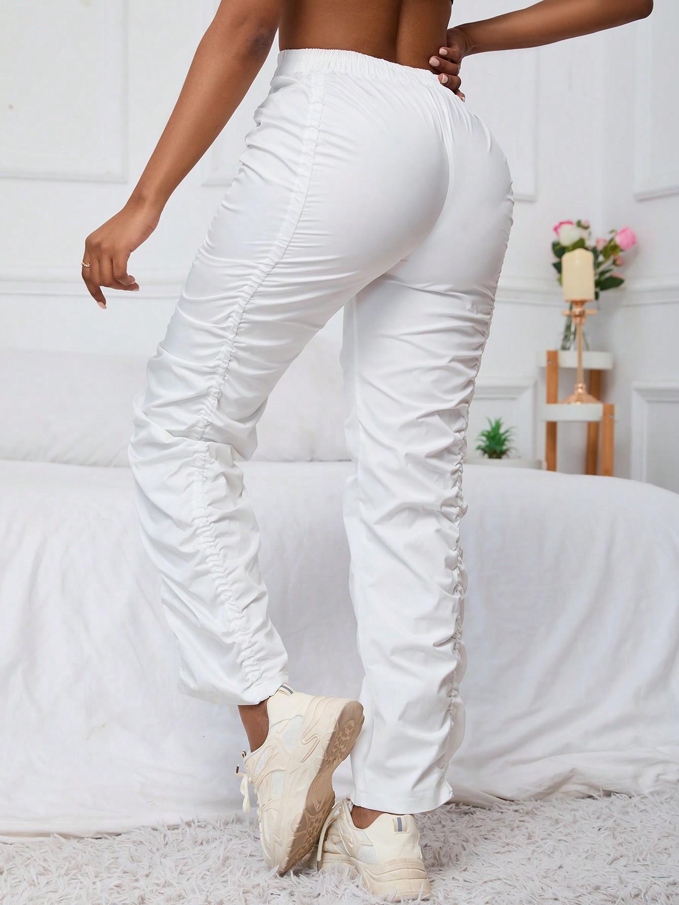 białe spodnie z gumką w pasie marszczenia high waist