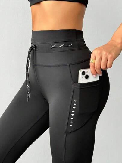 czarne legginsy sportowe