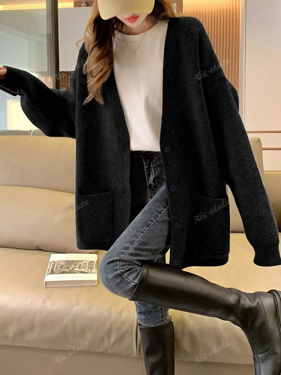 CZARNY LUŹNY SWETER