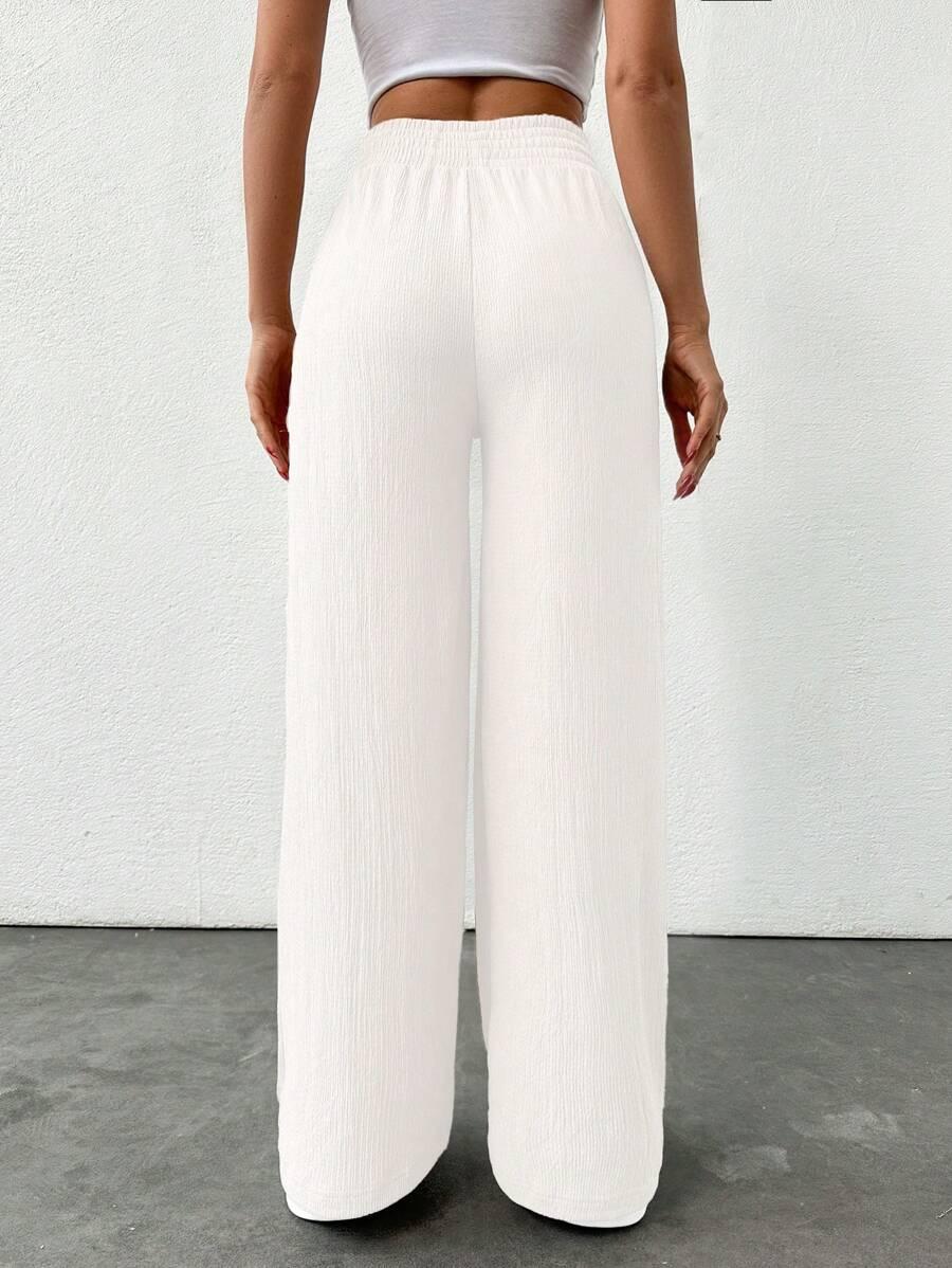 BIAŁE PROSTE SPODNIE