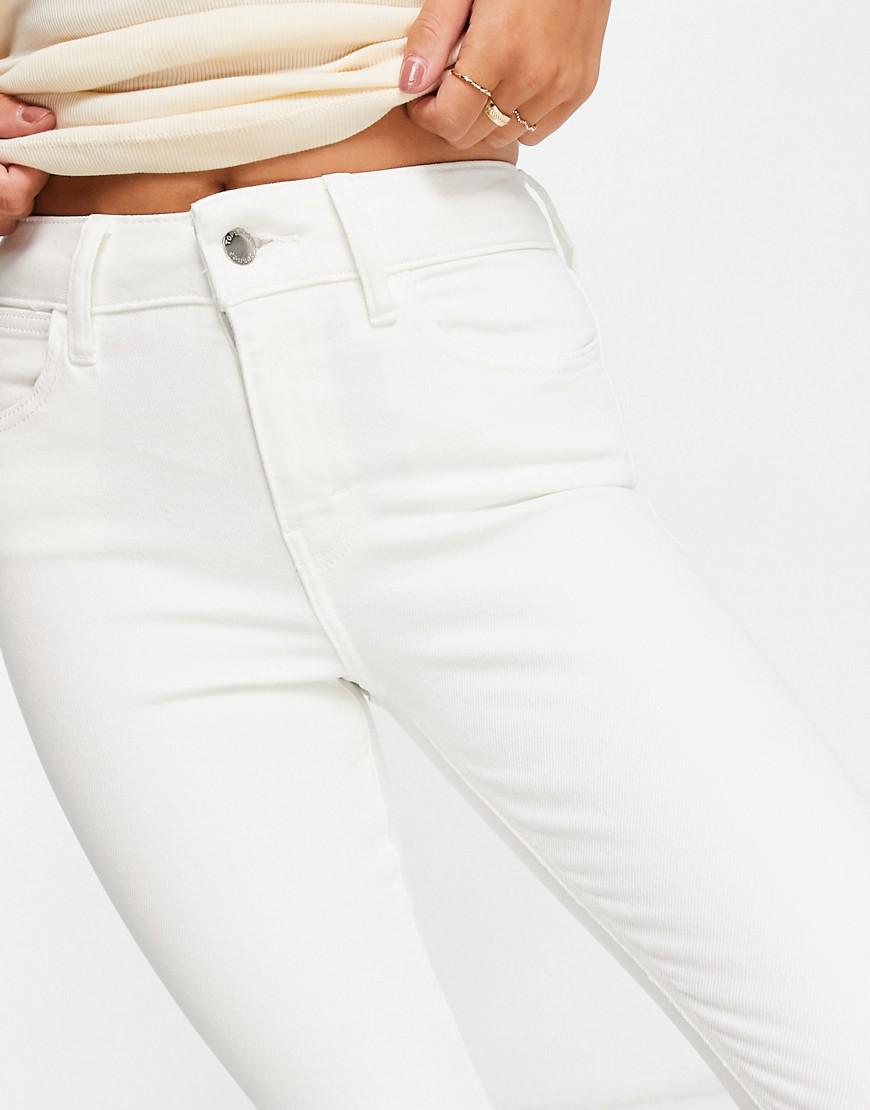 BIAŁE SPODNIE JEANS
