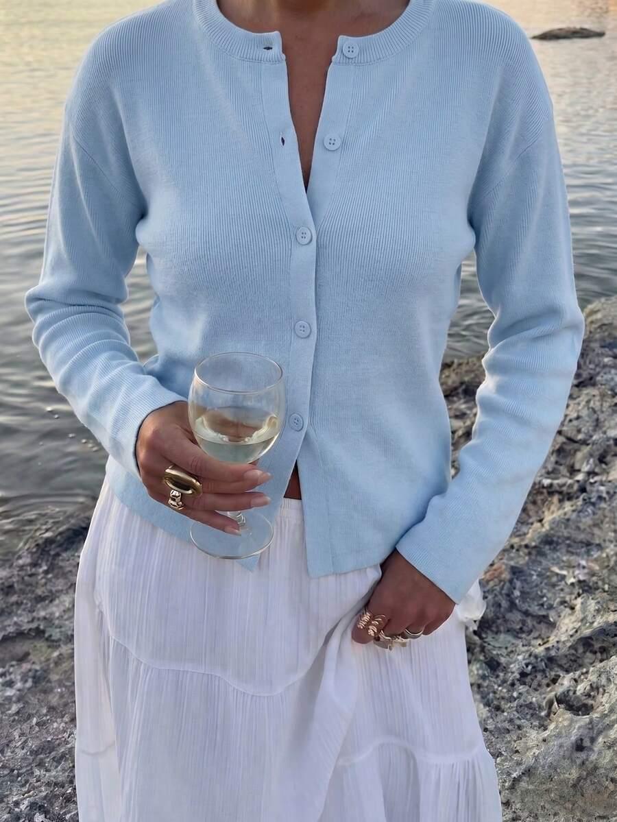 niebieski sweter guziki 