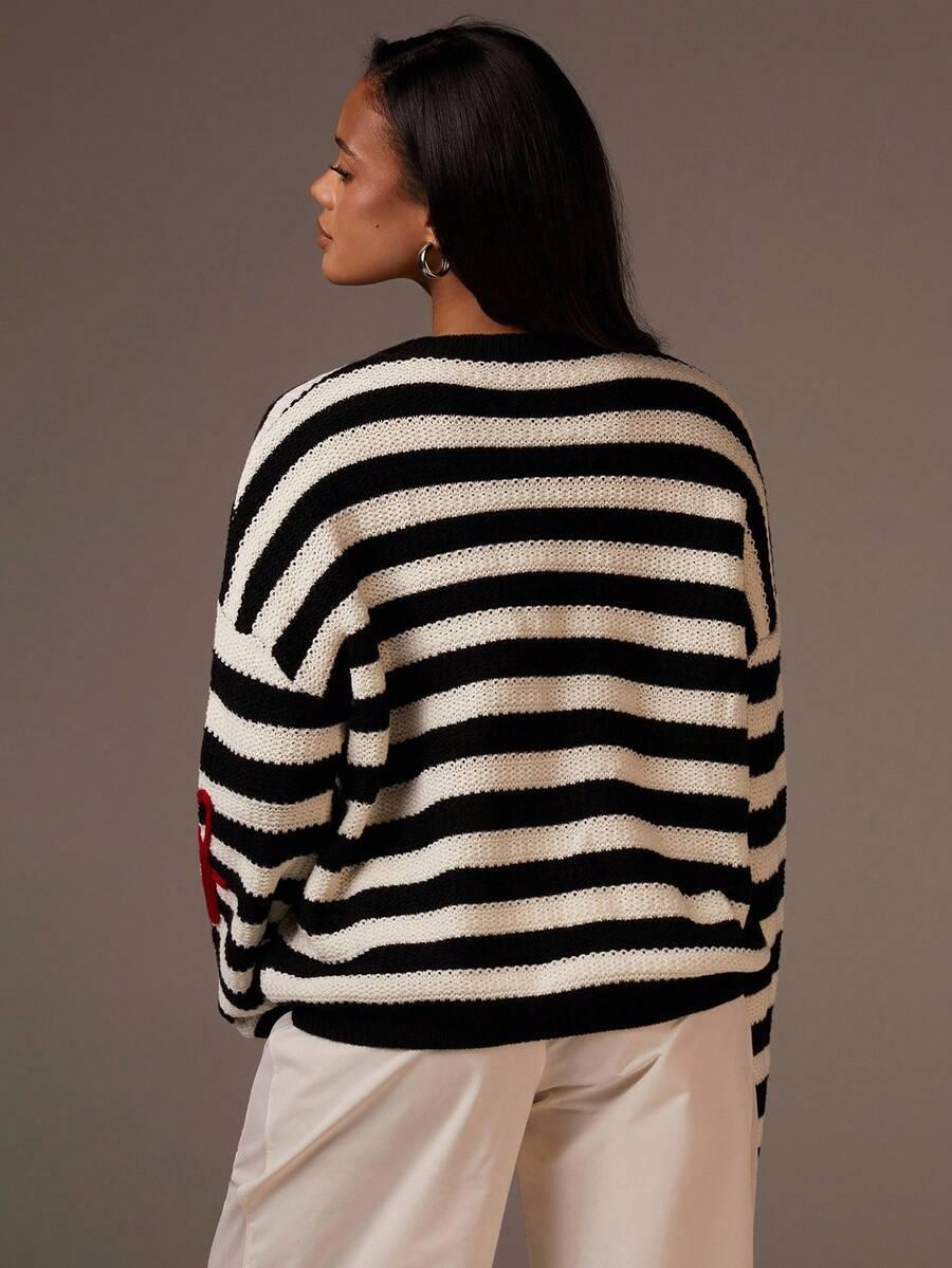 sweter w paski