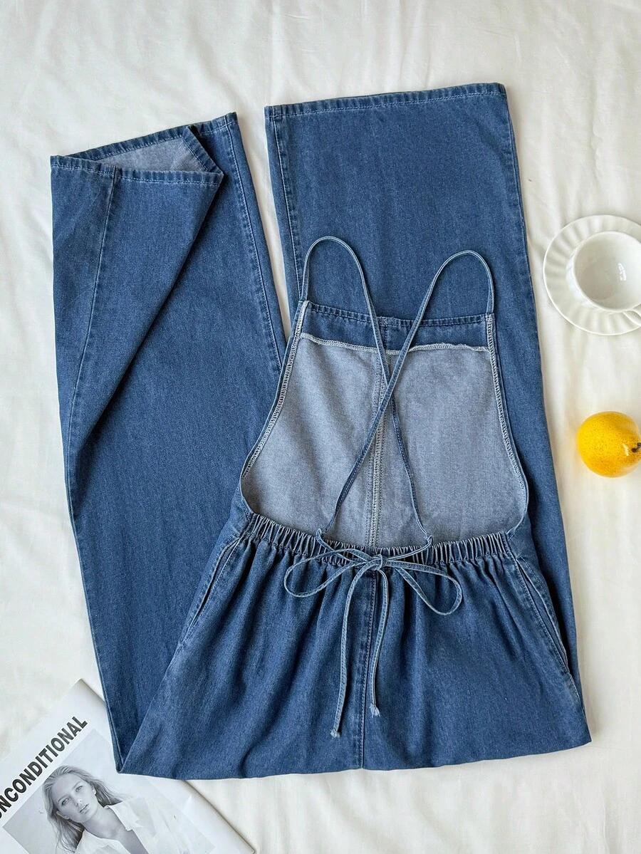 niebieski kombinezon jeans