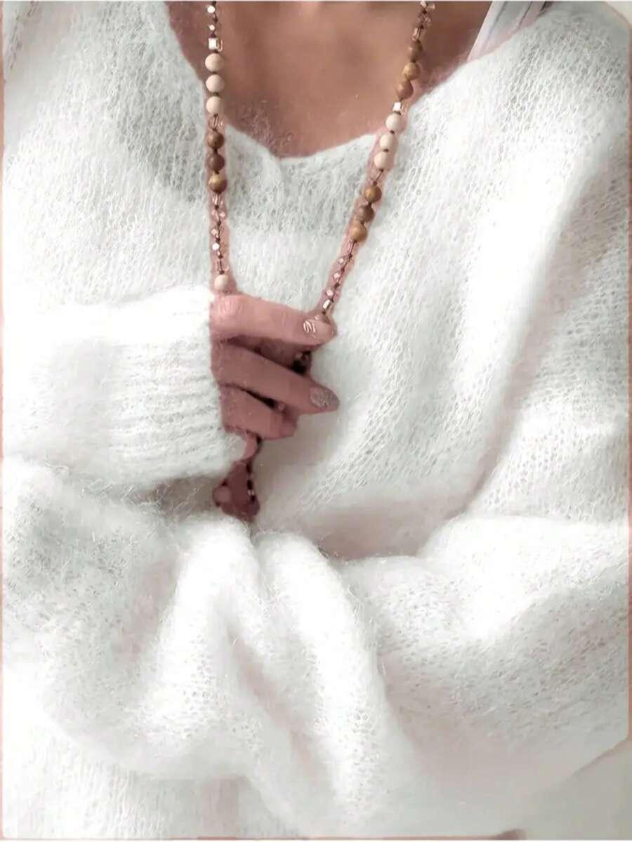 BIAŁY DZIANINOWY SWETER