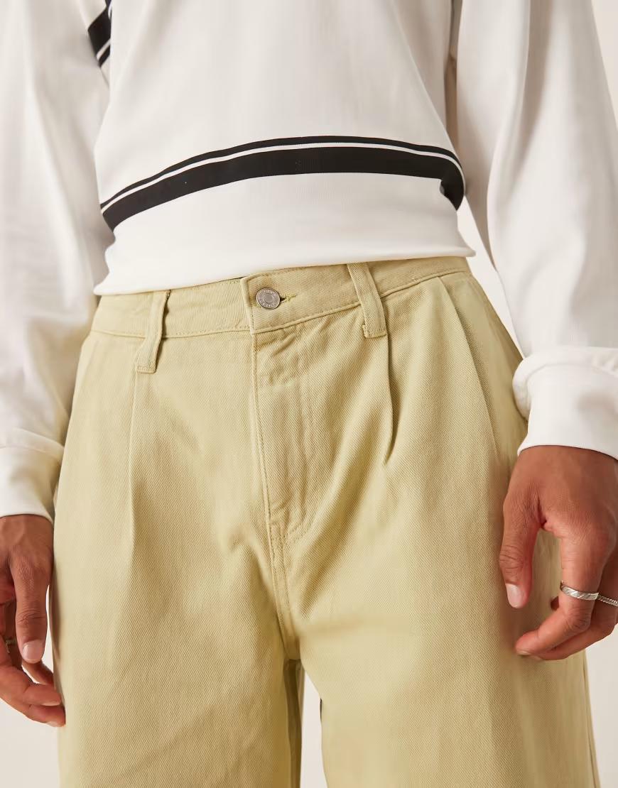 zielone spodnie jeans kieszenie