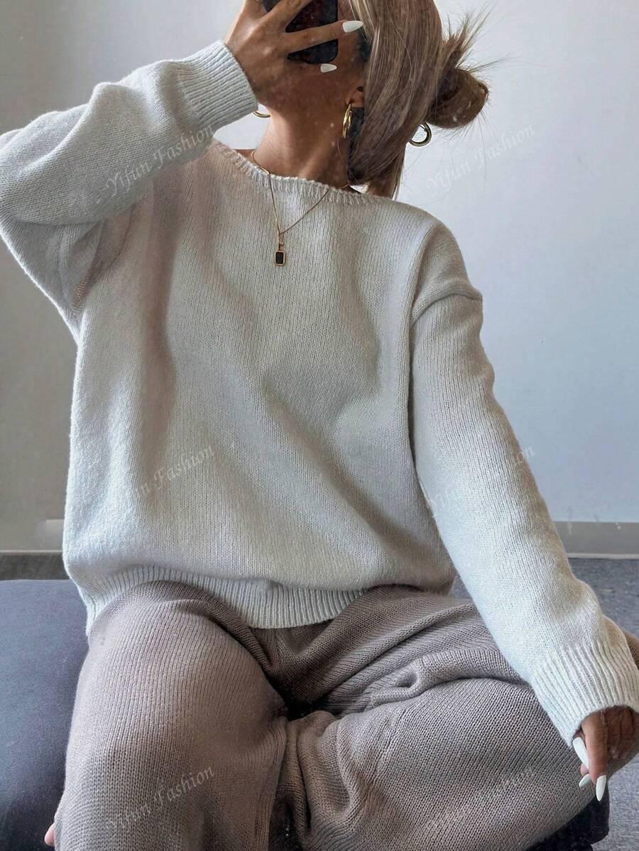 BEŻOWY SWETER KOKARDY 