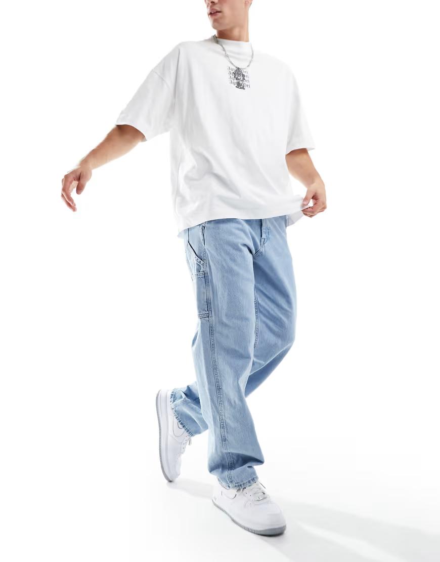 niebieskie spodnie jeans kieszenie