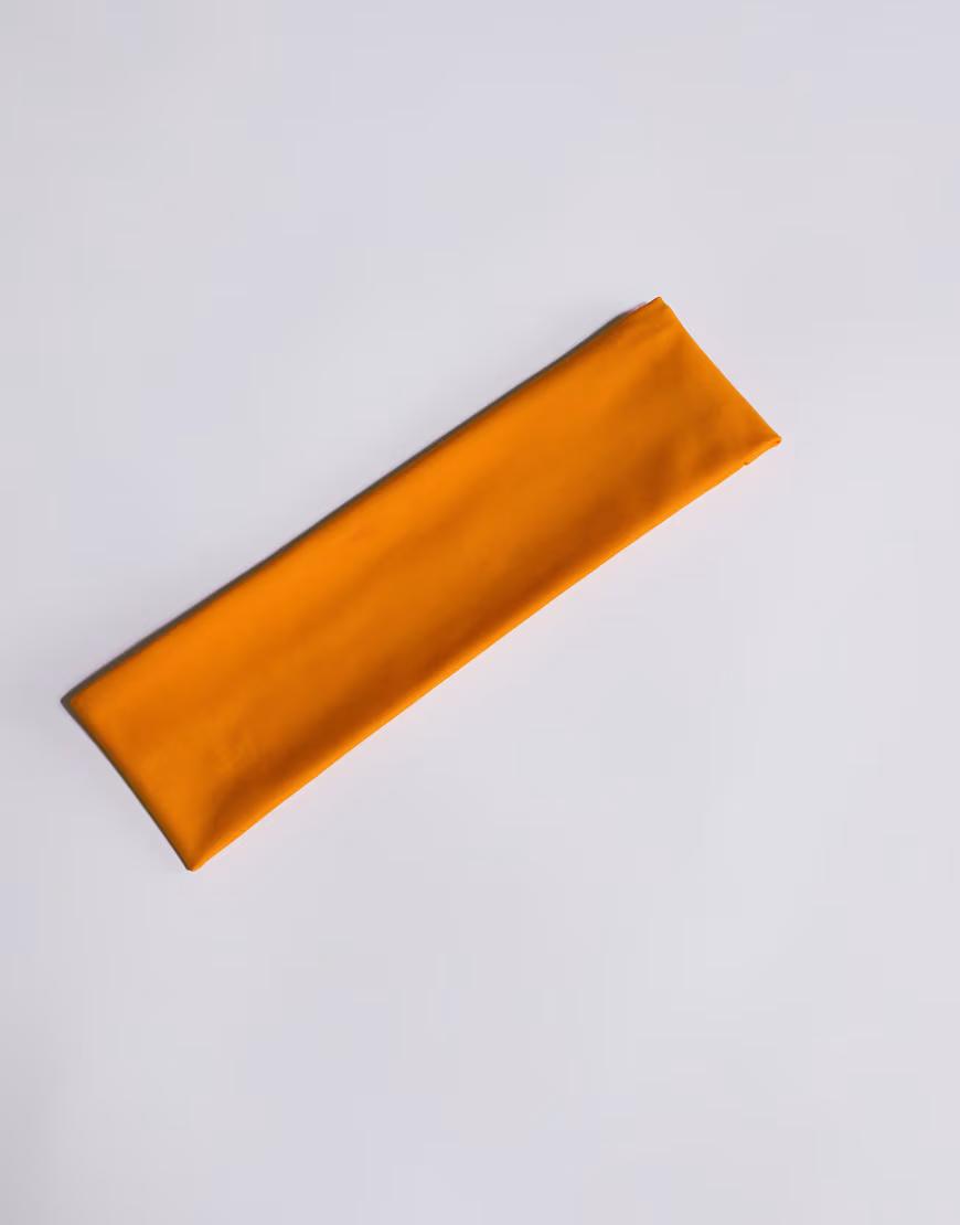 pomarańczowa sportowa opaska