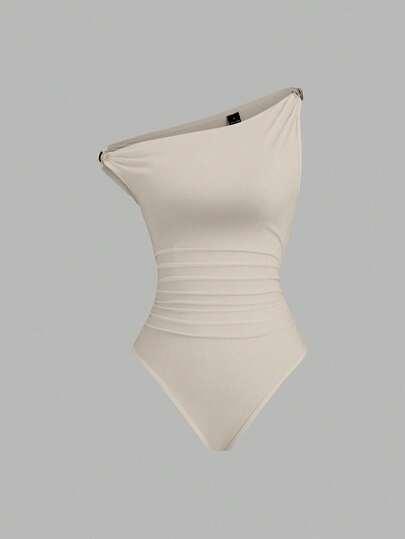 bezowe body zdobienie