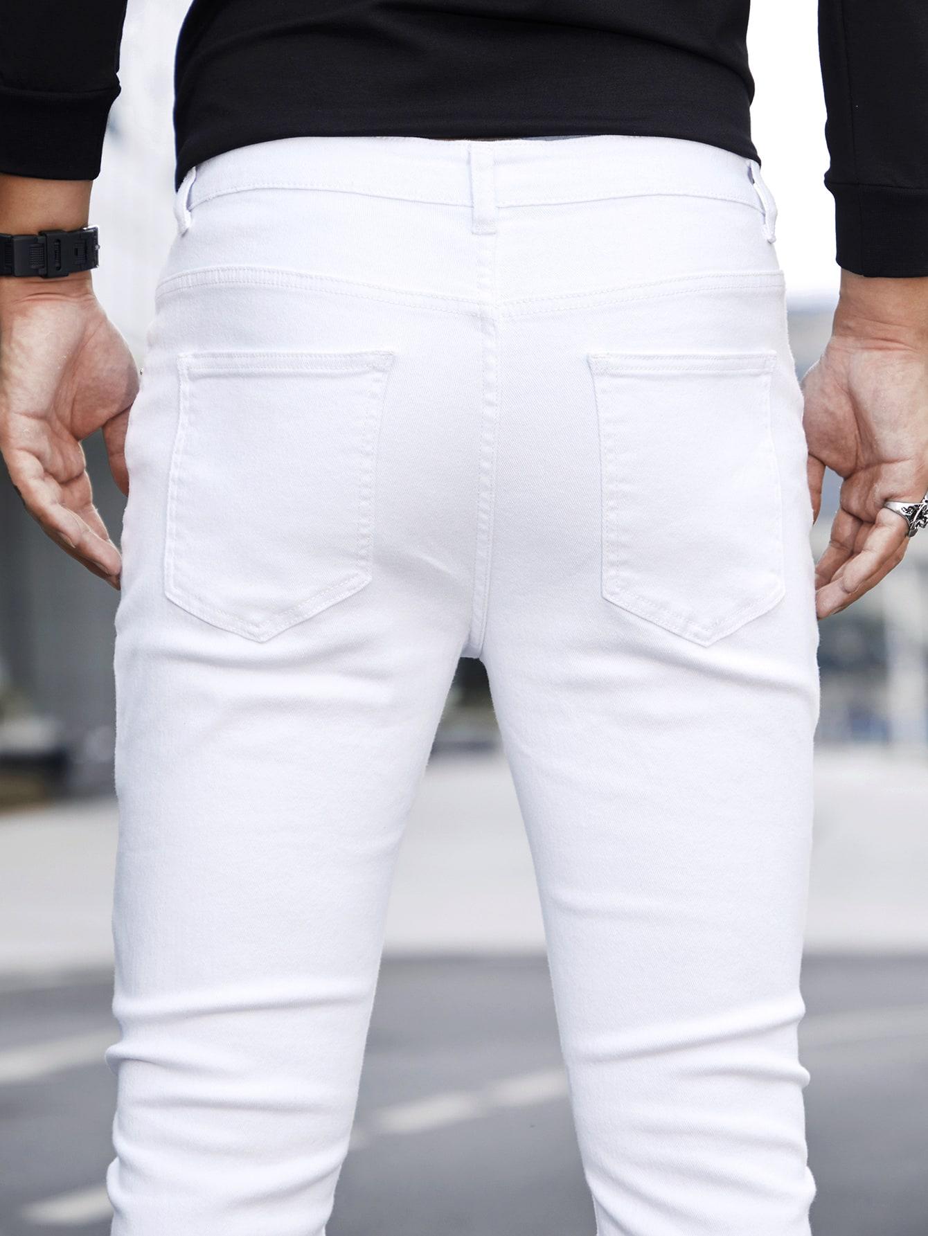 BIAŁE SPODNIE JEANS