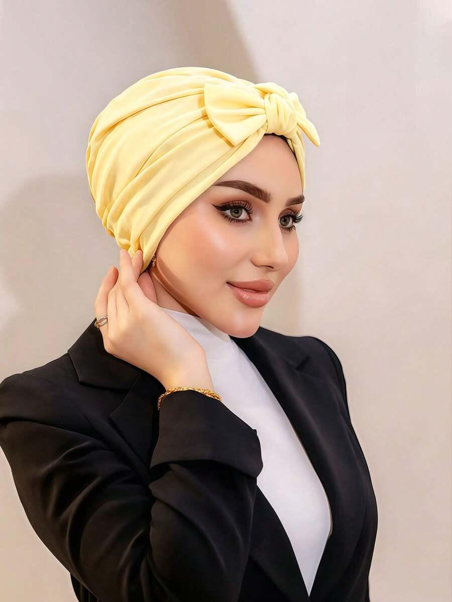 żółty turban kokarda