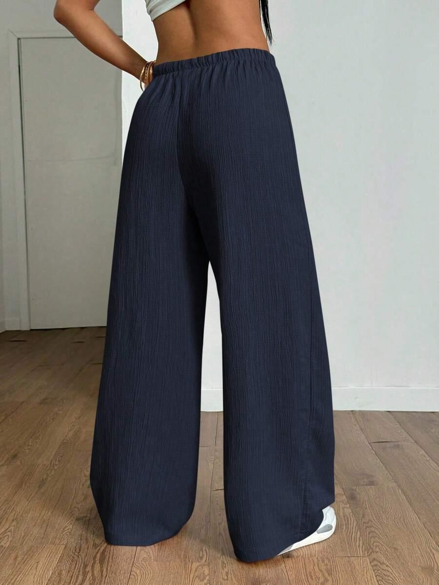 granatowe spodnie casual