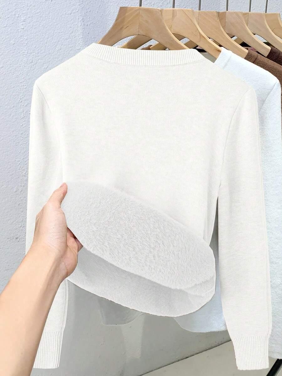 BIAŁY DZIANINOWY SWETER