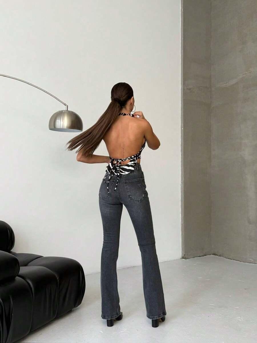 szare jeansy przetarcia 