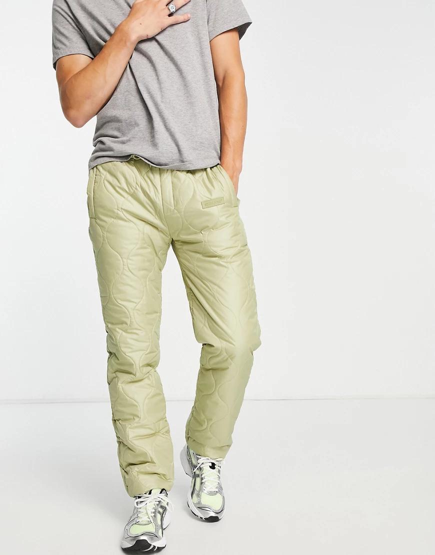 zielone pikowane spodnie joggery