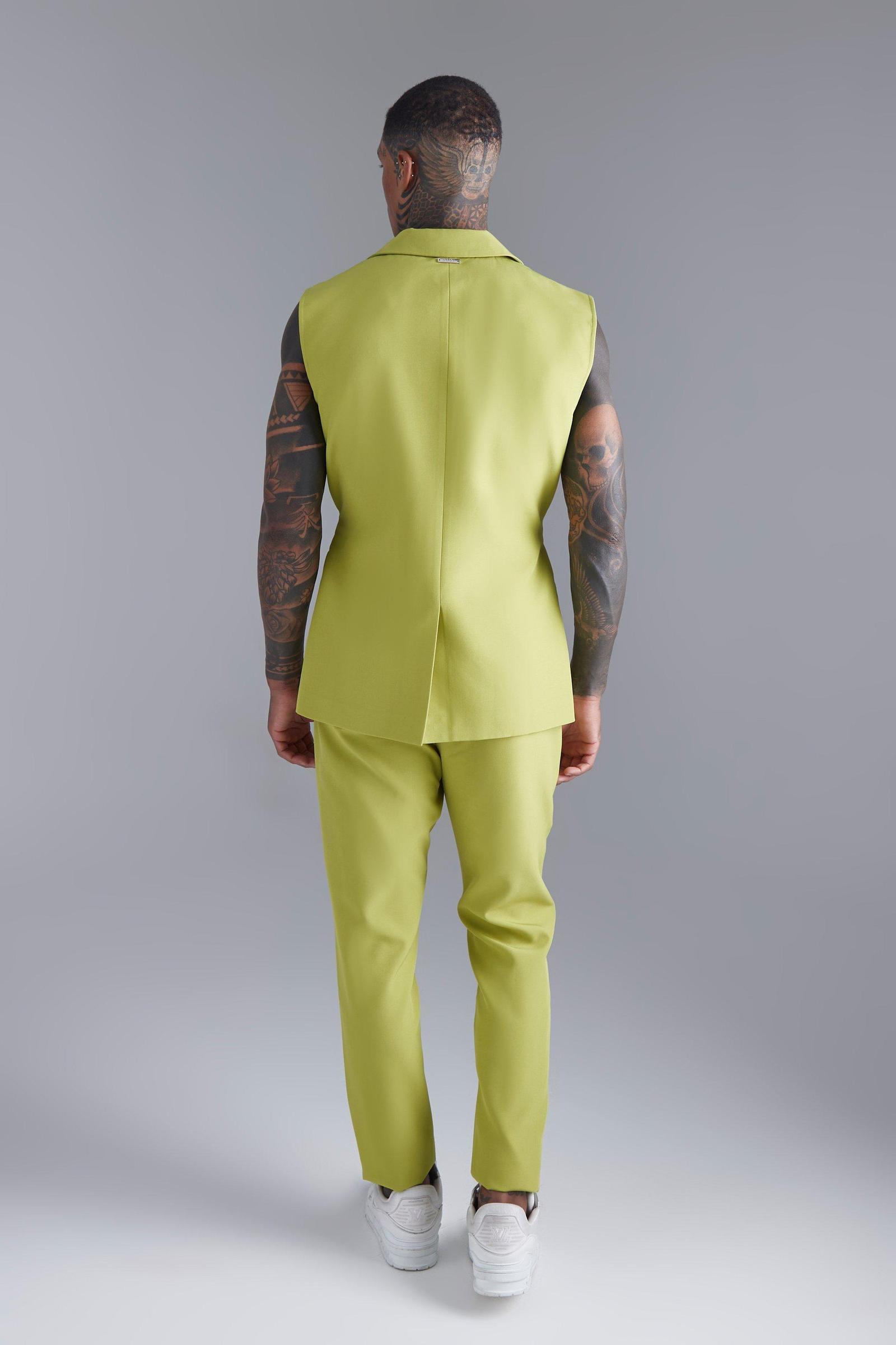 zielone zwężane spodnie zip