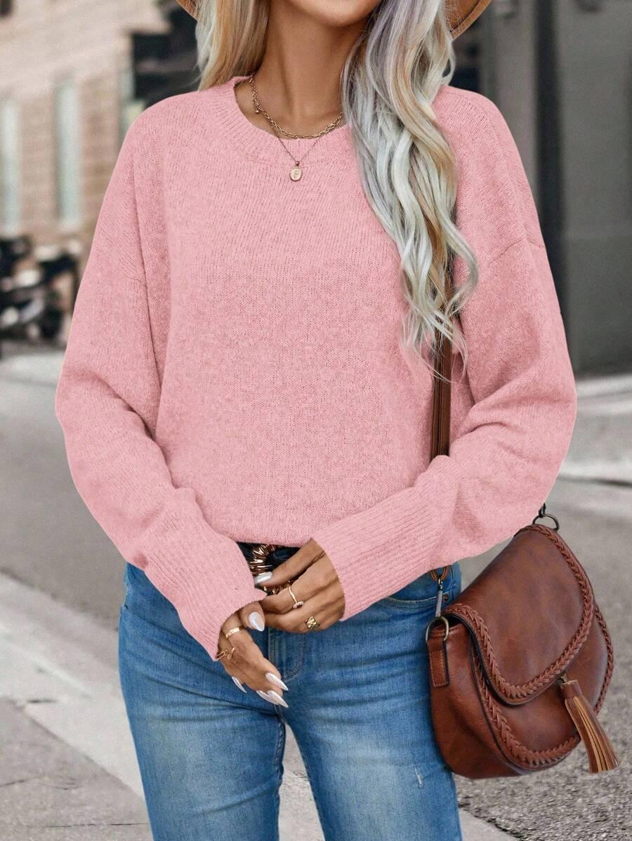 różowy sweter okrągły dekolt 
