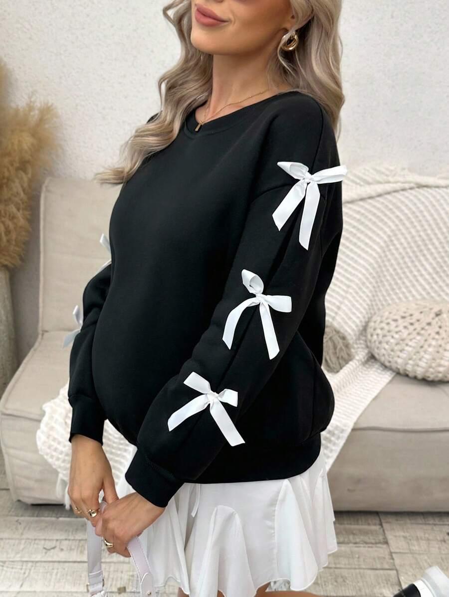 czarna bluza kokardy