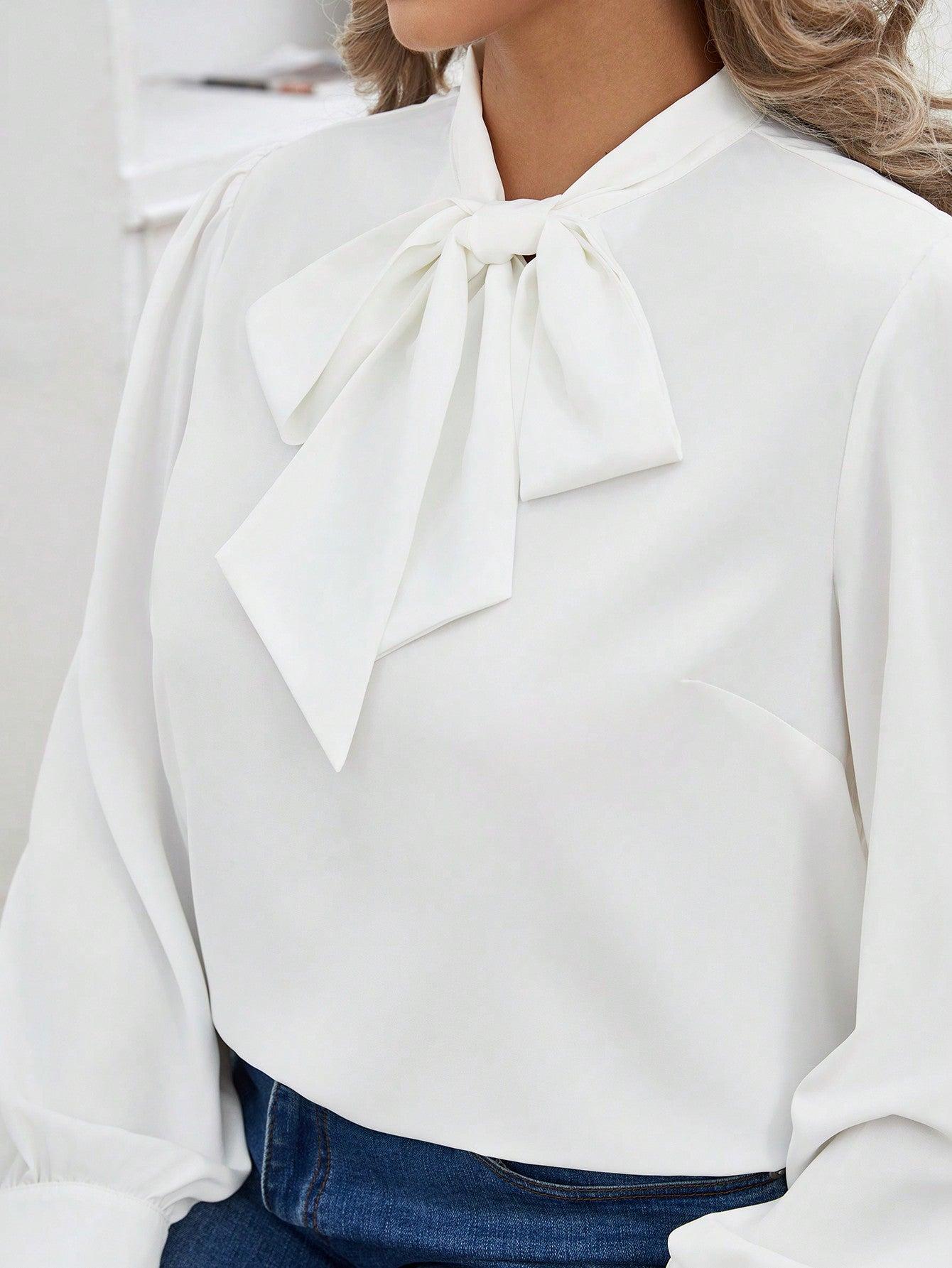 biała bluzka długi rękaw wiązanie kokarda
